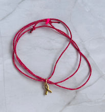Charger l'image dans la galerie, Bracelet octobre rose en Coton Rose vif fils d’or 3 tours Coulissant petit ruban doré