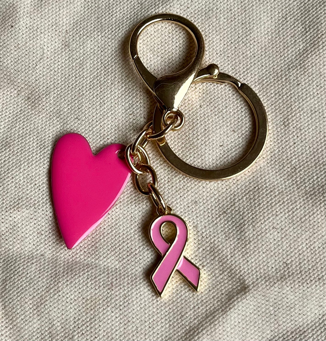 Porte clé bijou de sac octobre rose en acier inoxydable doré avec cœur rose vif et ruban rose clair