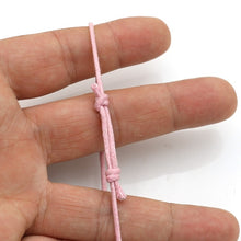Charger l&#39;image dans la galerie, Bracelet octobre rose en Coton Rose Coulissant charm cœur rose avec un œil et petit ruban doré
