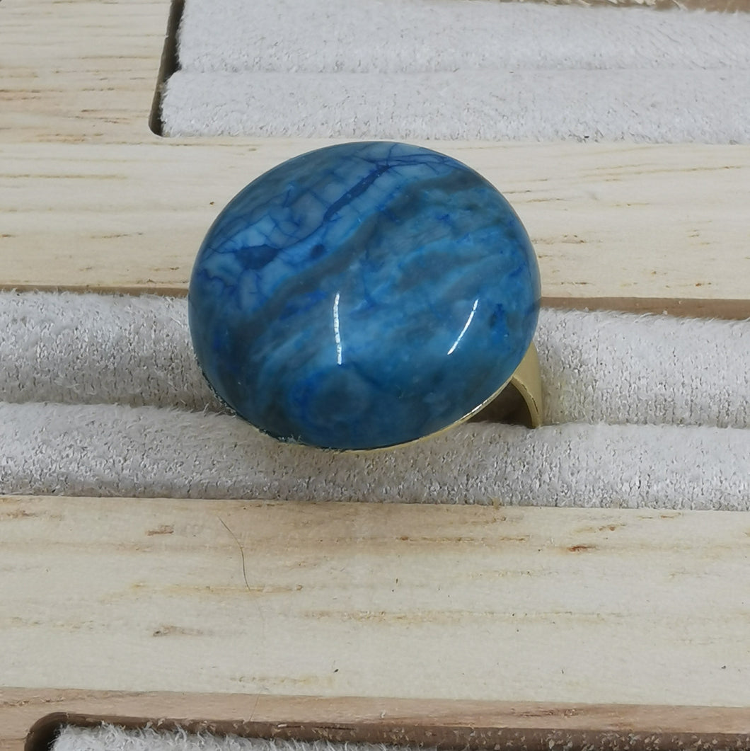 Bague Celine doré satiné et onyx bleue